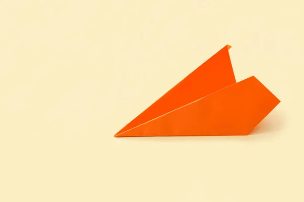 Orange Paper Plane Beige Background — 图库照片