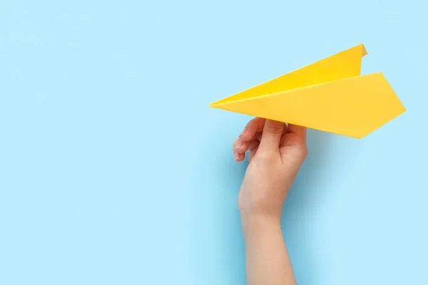 Woman Yellow Paper Plane Blue Background — Fotografia de Stock