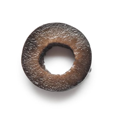 Slice of tasty black olive on white background