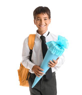 Little boy with school cone on white background