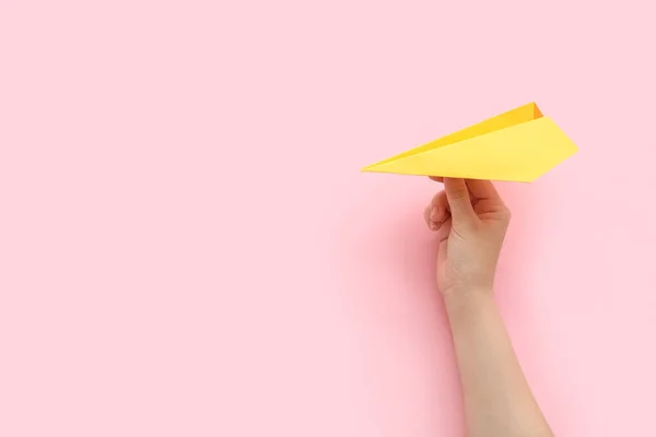 Woman Yellow Paper Plane Pink Background — Stockfoto