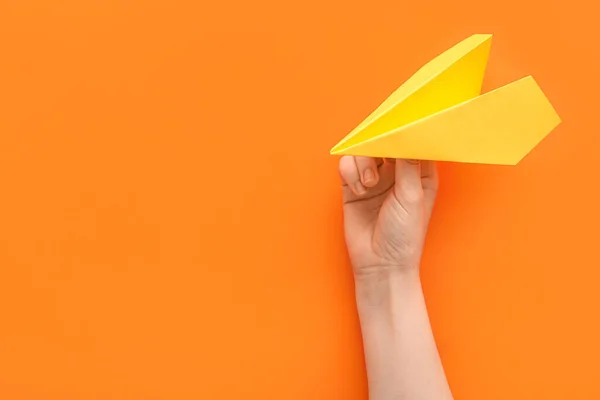 Woman Yellow Paper Plane Orange Background — Stockfoto