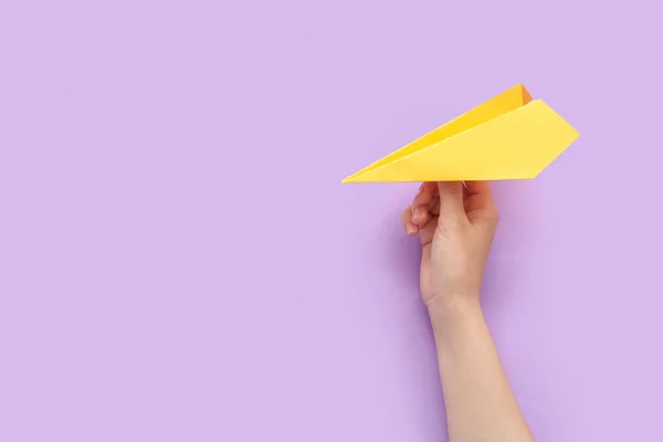 Woman Yellow Paper Plane Lilac Background — Stock Photo, Image