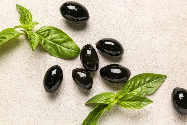 Tasty Black Olives Basil Light Background — Foto de Stock