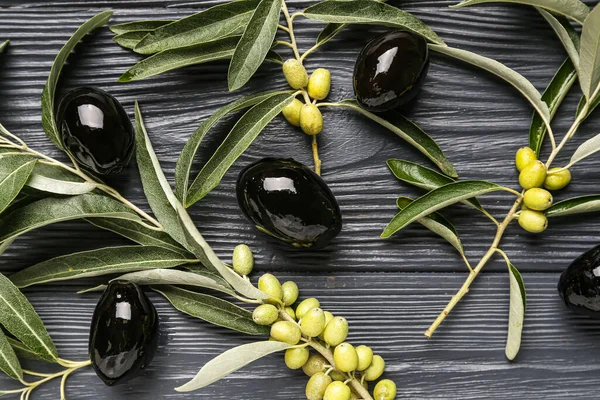 Tasty Black Olives Tree Branches Dark Wooden Background Closeup — Foto de Stock