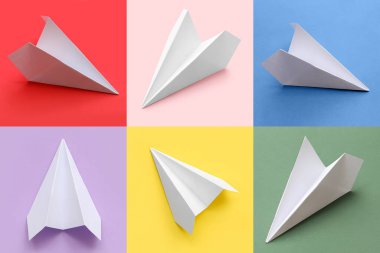 Many paper planes on colorful background