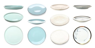 Set of empty ceramic plates isolated on white