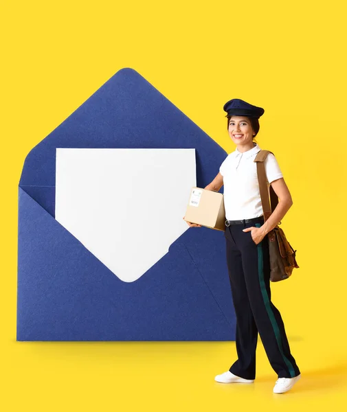 Postwoman Big Envelope Yellow Background — Photo