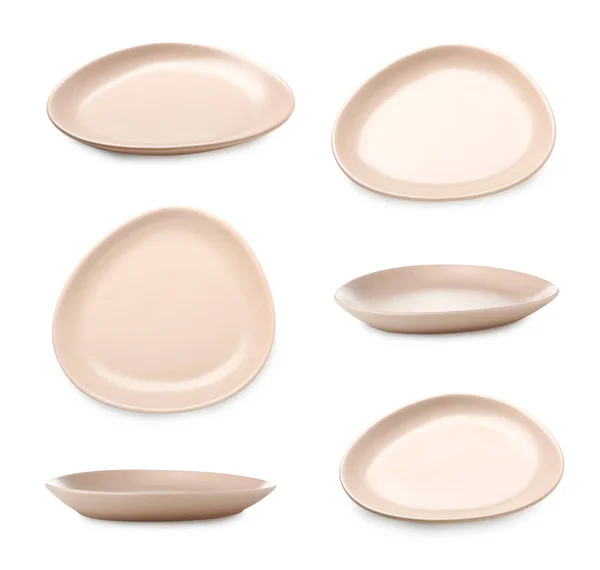 Set Beige Ceramic Plates Isolated White — Stockfoto