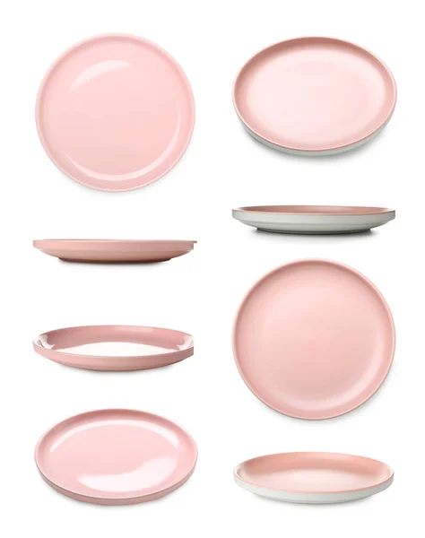 Набор Розовых Керамических Пластин Изолированы Белом — стоковое фото