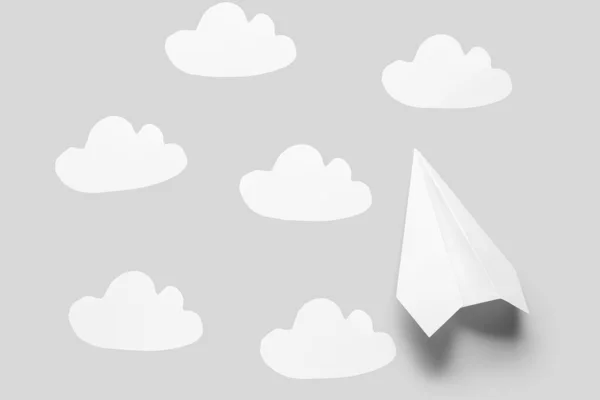 Paper Plane Clouds Grey Background — Zdjęcie stockowe