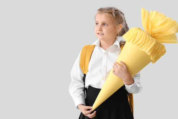Cute Little Girl Yellow School Cone Light Background - Stock-foto