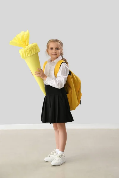 Cute Little Girl Yellow School Cone Light Wall — Stock Photo, Image