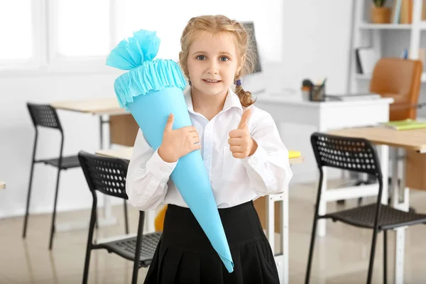 Cute Little Girl Blue School Cone Showing Thumb Classroom — Fotografie, imagine de stoc