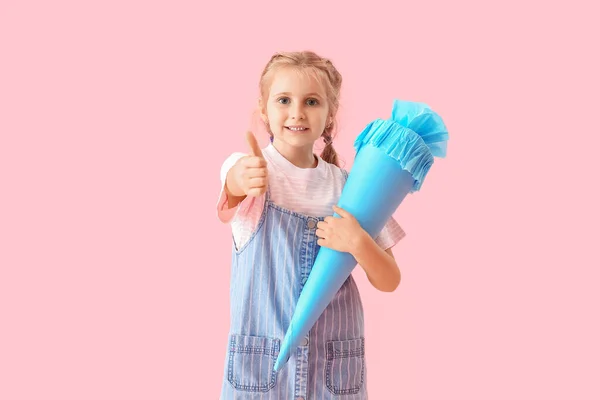 Cute Little Girl Blue School Cone Showing Thumb Pink Background — Stock Photo, Image