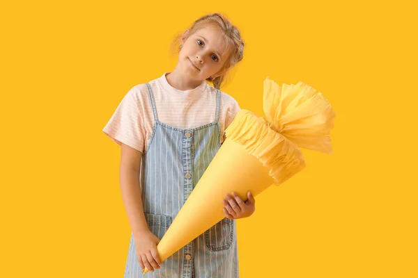 Cute Little Girl School Cone Yellow Background — Stockfoto