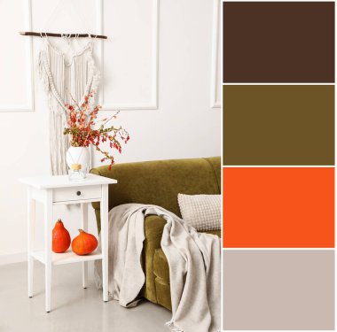 Stylish autumn decor on table in interior of living room. Different color patterns
