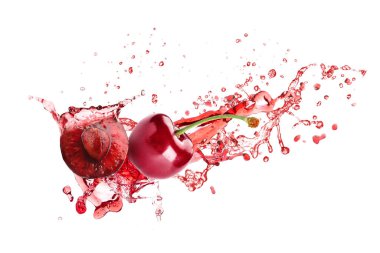 Sweet cherries and splash of juice isolated on white