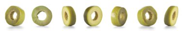 Set of cut green olives isolated on white