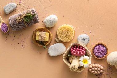 Beautiful spa composition with massage soap on color background