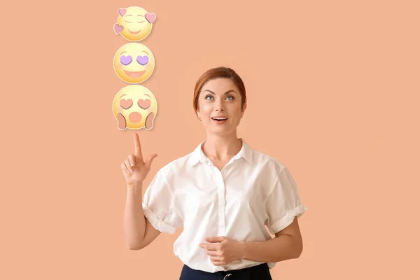 Surprised Young Woman Pointing Different Emoticons Color Background — Stockfoto