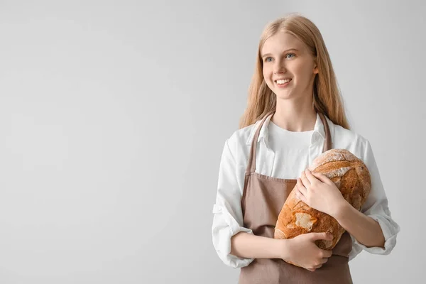 Young Woman Fresh Bread Light Background — Stock Photo, Image