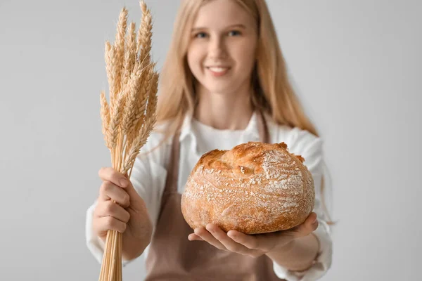 Young Woman Fresh Bread Spikelets Light Background Closeup — Zdjęcie stockowe