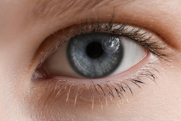 Young woman with blue eyes, closeup