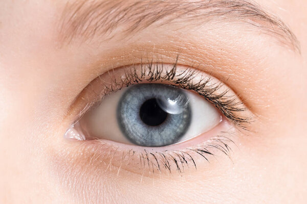 Young woman with blue eyes, closeup