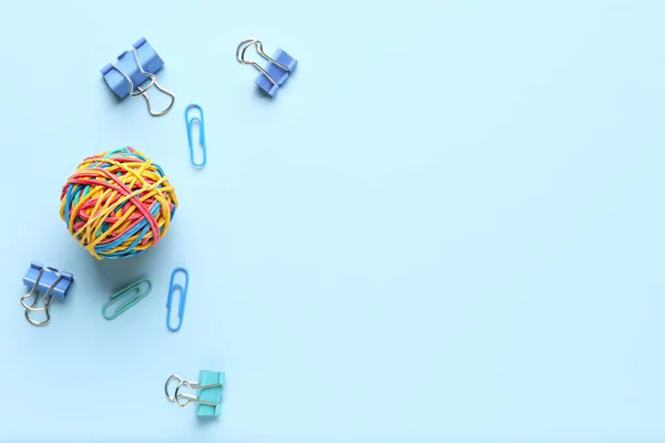 Colorful Rubber Band Ball Paper Clips Blue Background — Foto de Stock