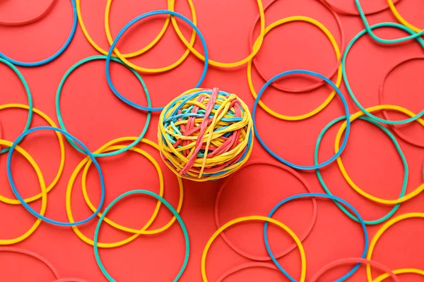 Colorful Rubber Band Ball Red Background — 스톡 사진