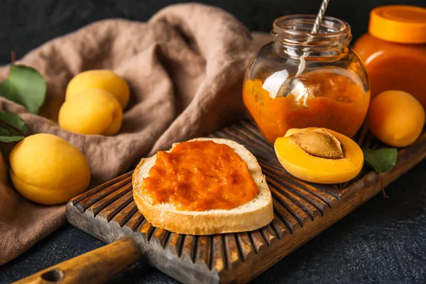 Wooden Board Tasty Sandwich Apricot Jam Fruits Dark Background Closeup — Stock Photo, Image