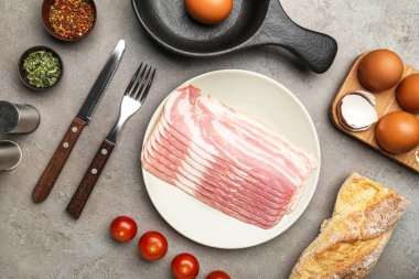 Composition with ingredients for preparing tasty fried eggs on grunge background