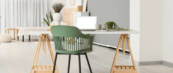 Modern Workplace Laptop Green Chair Studio Apartment —  Fotos de Stock