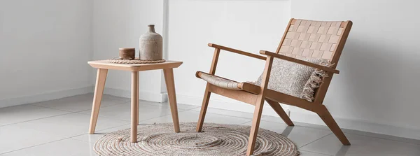 Stylish Wicker Armchair Wooden Table Vase Light Wall Room — 스톡 사진