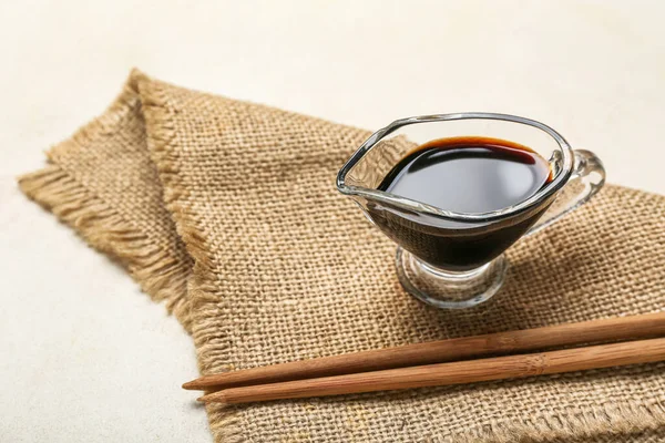 Gravy Boat Soy Sauce Chopsticks Sack Cloth White Background — Stockfoto