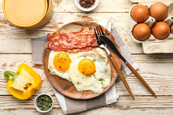 Plate Tasty Fried Eggs Bacon Ingredients Light Wooden Background — Stock Photo, Image