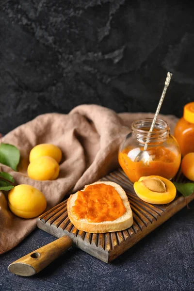 Wooden Board Tasty Sandwich Apricot Jam Fruits Dark Background — Stock Photo, Image