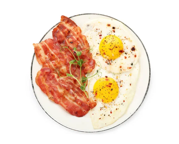 Plate Tasty Fried Eggs Bacon Spices White Background — Stock Fotó