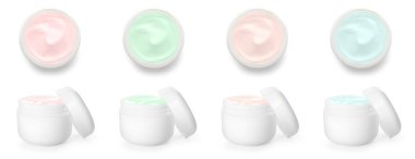 Jars of cosmetic cream isolated on white