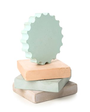 Different decorative podiums for presentation of cosmetic products on white background