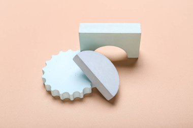 Set of showcase pedestals on color background