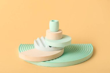 Composition with empty showcase pedestal on color background