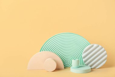 Abstract composition with empty showcase pedestal on color background