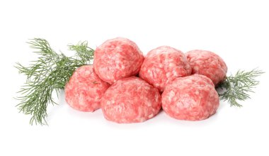 Raw meat balls with dill on white background