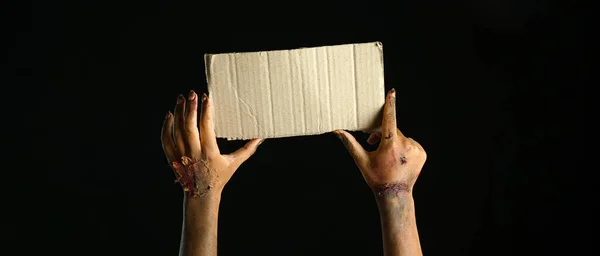 Hands Zombie Blank Cardboard Sheet Dark Background Halloween Concept — Foto Stock