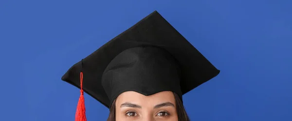 Female Graduating Student Blue Background Closeup — Zdjęcie stockowe