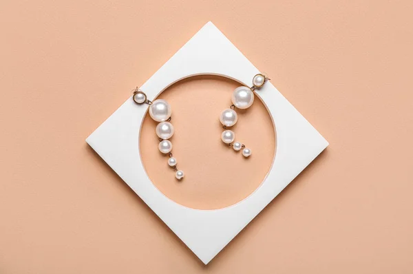 Stylish Pearl Earrings Beige Background — Foto de Stock