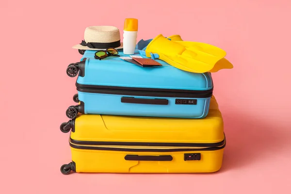 Suitcases Passports Tickets Beach Accessories Pink Background — Stock fotografie