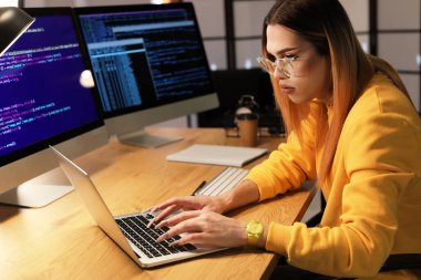 Transgender programmer working in server room